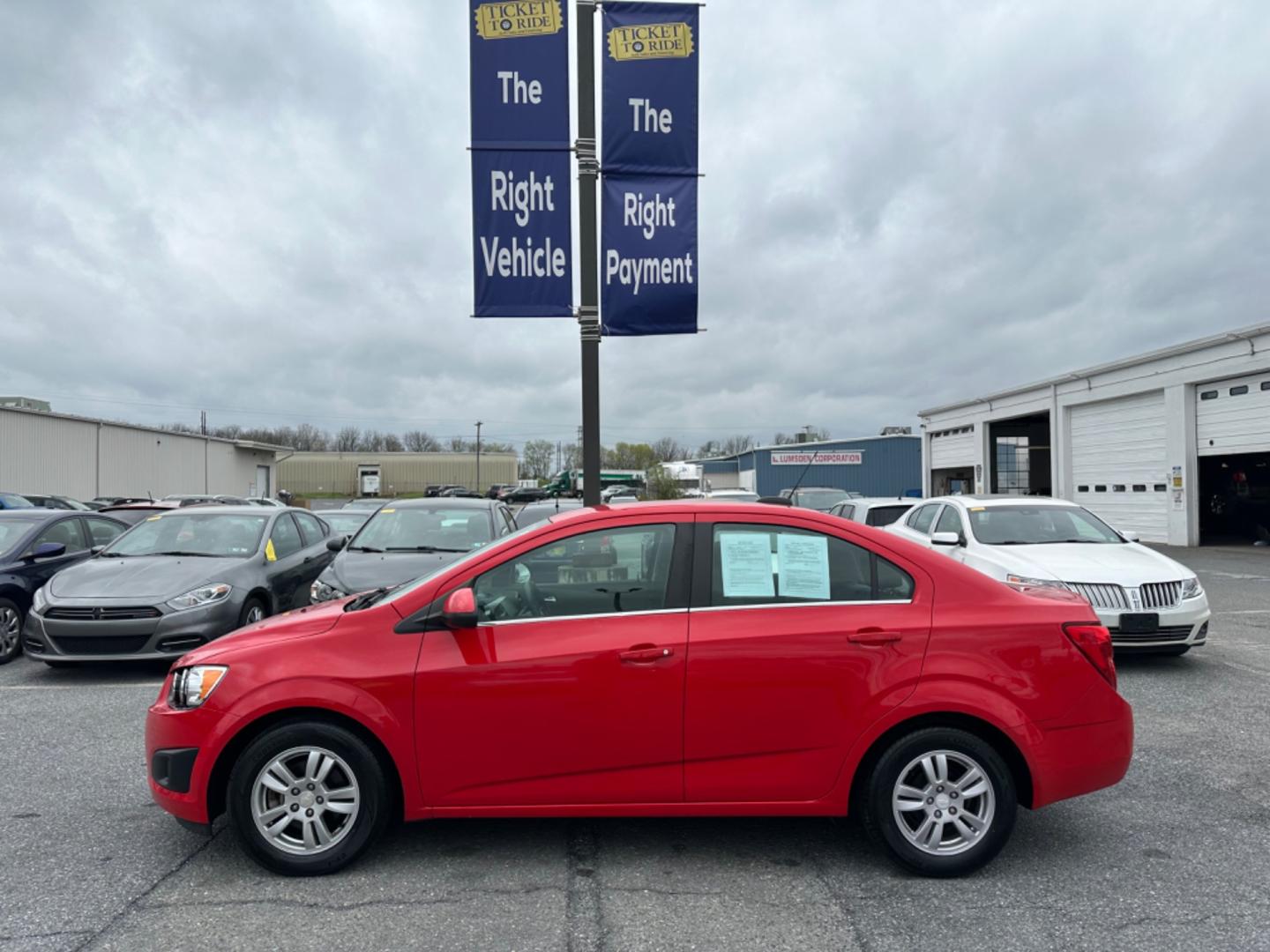 2015 RED Chevrolet Sonic LT Auto Sedan (1G1JC5SH6F4) with an 1.8L L4 DOHC 24V engine, 6-Speed Automatic transmission, located at 1254 Manheim Pike, Lancaster, PA, 17601, (717) 393-9133, 40.062870, -76.323273 - Photo#9